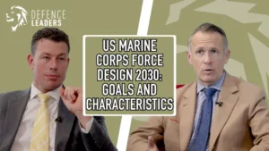 Two men in suits are shown, separated by text reading "US marine corps force design 2030: goals and characteristics."