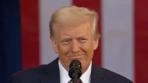 Trump smiles in front of a podium in congress